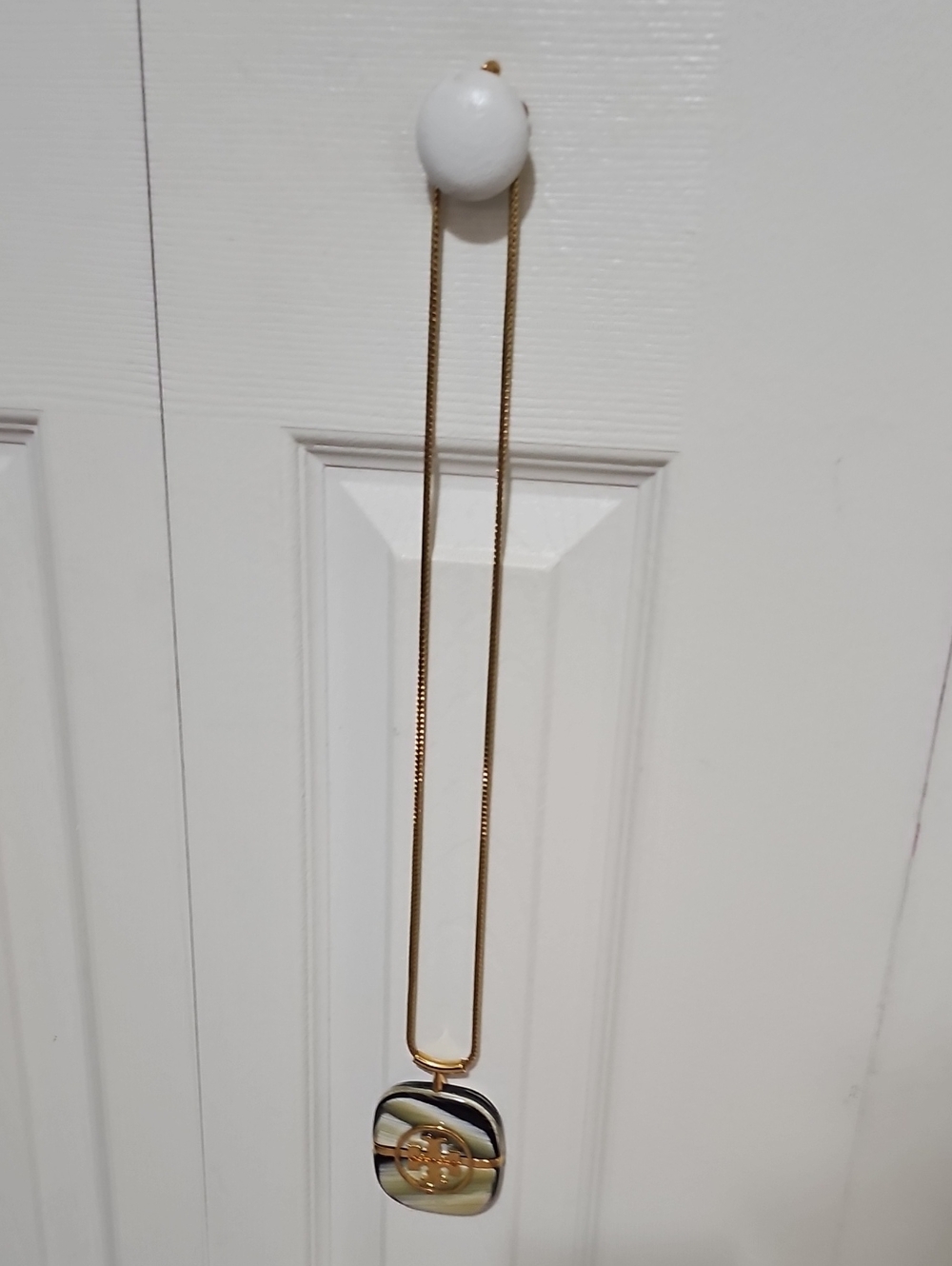 Tory Burch Gold-Tone Necklace with Black, White and Gold Resin Pendant